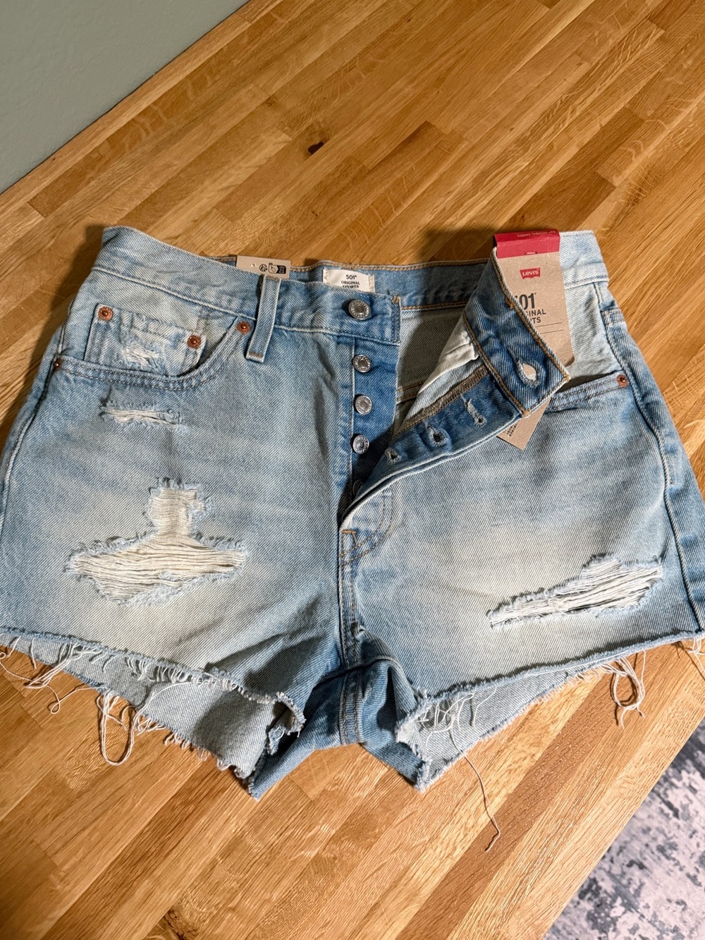 Levi's 501 Light Blue Distressed Denim Shorts